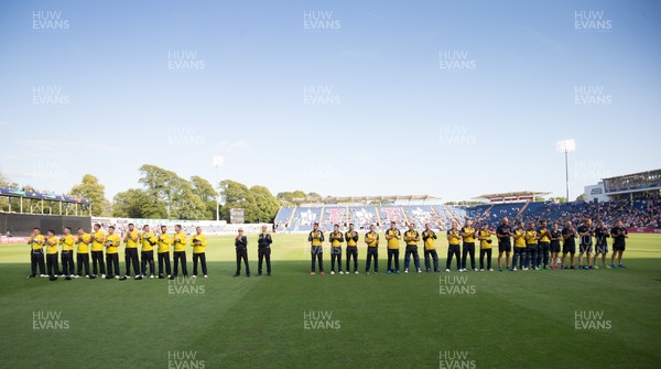 010819 - Glamorgan v Gloucestershire, Vitality Blast 2019 - The teams line up for a minutes applause in memory of former Glamorgan player Malcolm Nash, who passed away this week