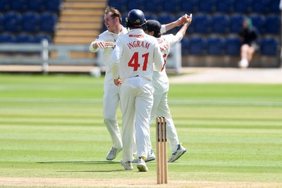020725 - Glamorgan v Gloucestershire - Rothesay County Championship - Ben Kellaway of Glamorgan bowls the ball to dismiss Ollie Price of Gloucestershire
