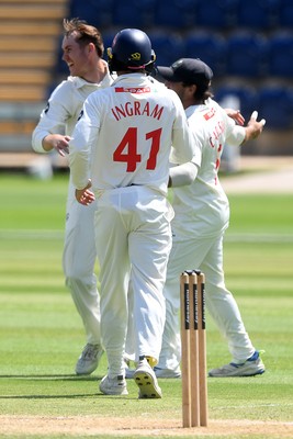 020725 - Glamorgan v Gloucestershire - Rothesay County Championship - Ben Kellaway of Glamorgan bowls the ball to dismiss Ollie Price of Gloucestershire