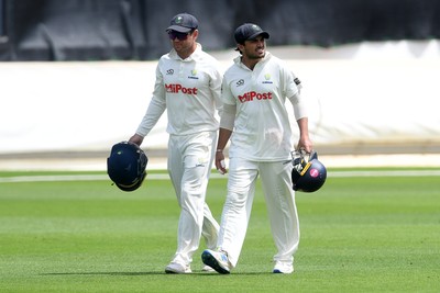 020725 - Glamorgan v Gloucestershire - Rothesay County Championship - Colin Ingram and Kiran Carlson of Glamorgan head in for lunch