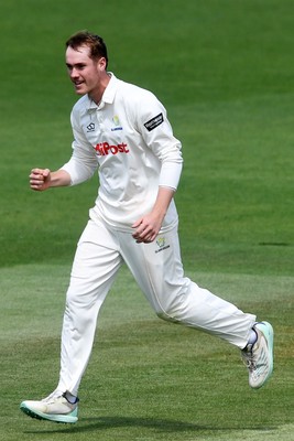 020725 - Glamorgan v Gloucestershire - Rothesay County Championship - Ben Kellaway of Glamorgan celebrates taking the wicket of Graeme van Buuren of Gloucestershire