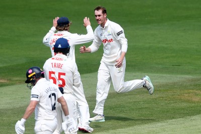 020725 - Glamorgan v Gloucestershire - Rothesay County Championship - Ben Kellaway of Glamorgan celebrates taking the wicket of Graeme van Buuren of Gloucestershire