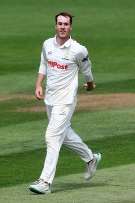 020725 - Glamorgan v Gloucestershire - Rothesay County Championship - Ben Kellaway of Glamorgan celebrates taking the wicket of Graeme van Buuren of Gloucestershire