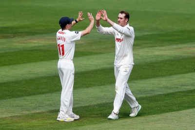 020725 - Glamorgan v Gloucestershire - Rothesay County Championship - Ben Kellaway of Glamorgan celebrates taking the wicket of Graeme van Buuren of Gloucestershire