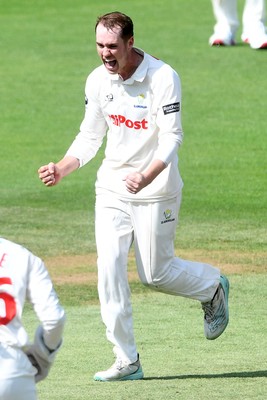 020725 - Glamorgan v Gloucestershire - Rothesay County Championship - Ben Kellaway of Glamorgan celebrates taking the wicket of Zaman Akhter of Gloucestershire
