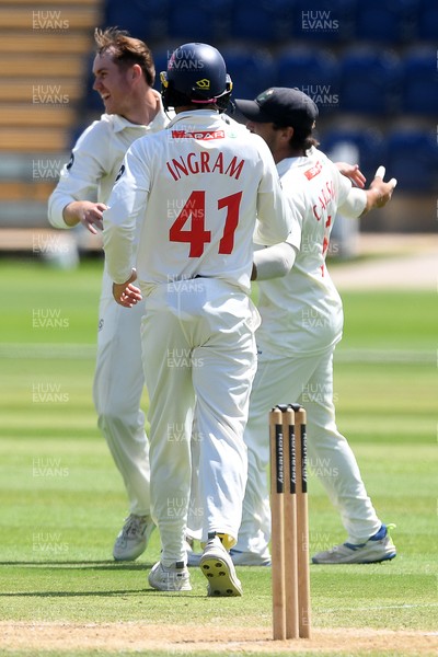 020725 - Glamorgan v Gloucestershire - Rothesay County Championship - Ben Kellaway of Glamorgan bowls the ball to dismiss Ollie Price of Gloucestershire
