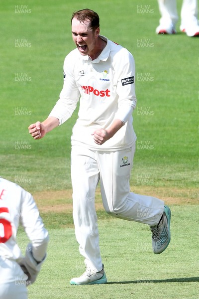 020725 - Glamorgan v Gloucestershire - Rothesay County Championship - Ben Kellaway of Glamorgan celebrates taking the wicket of Zaman Akhter of Gloucestershire