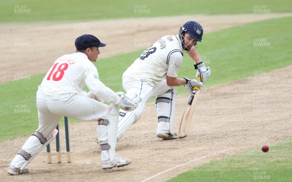 030812 - Glamorgan v Gloucestershire, LV County Championship Division 2 -  Gloucestershires' Ian Cockbain plays a shot past Glamorgans' Mark Wallace 