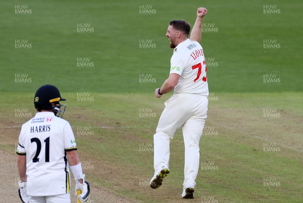 060423 - Glamorgan v Gloucestershire - LV= County Championship - David Lloyd of Glamorgan celebrates as James Bracey of Gloucestershire is caught out by Chris Cooke