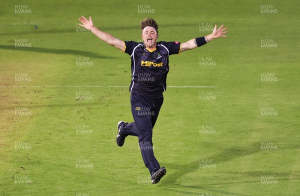 070622 -  Glamorgan v Gloucestershire, T20 Vitality Blast - Dan Douthwaite of Glamorgan  celebrates after taking the wicket of Ryan Higgins of Gloucestershire for 0