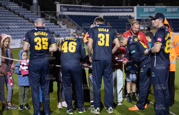 070622 -  Glamorgan v Gloucestershire, T20 Vitality Blast - Players sign auto graphs at the end of the match