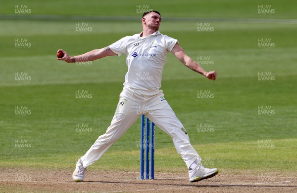 080423 - Glamorgan v Gloucestershire - LV= County Championship - Harry Podmore of Glamorgan bowling