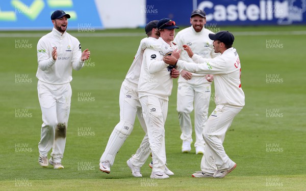 080423 - Glamorgan v Gloucestershire - LV= County Championship - Sam Northeast of Glamorgan celebrates after catching the ball to dismiss Ollie Price off the bowling of Timm Van Der Gugten