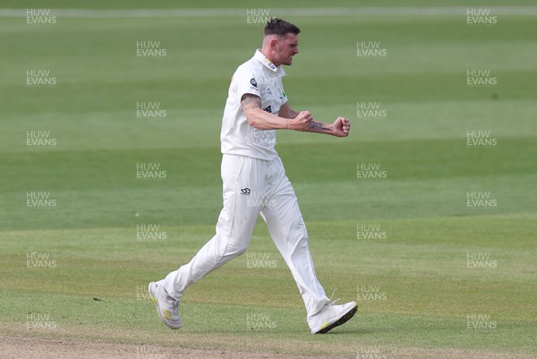 090423 - Glamorgan v Gloucestershire - LV= County Championship - Harry Podmore of Glamorgan celebrates after Jack Taylor is caught by Chris Cooke