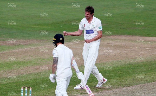 100918 - Glamorgan v Gloucestershire - Specsavers Championship Division Two - Michael Hogan of Glamorgan celebrates after bowling Chris Dent out for LBW