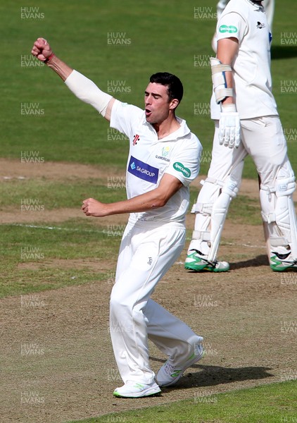 100918 - Glamorgan v Gloucestershire - Specsavers Championship Division Two - Ruaidhri Smith of Glamorgan celebrates after bowling Miles Hammond out for LBW