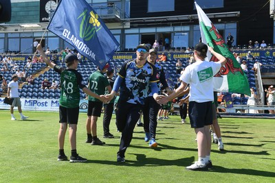 130725 - Glamorgan v Gloucestershire - T20, Vitality Blast - Dan Douthwaite of Glamorgan runs out for the start of the match