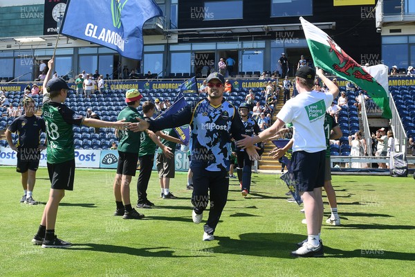 130725 - Glamorgan v Gloucestershire - T20, Vitality Blast - Kiran Carlson of Glamorgan runs out for the start of the match