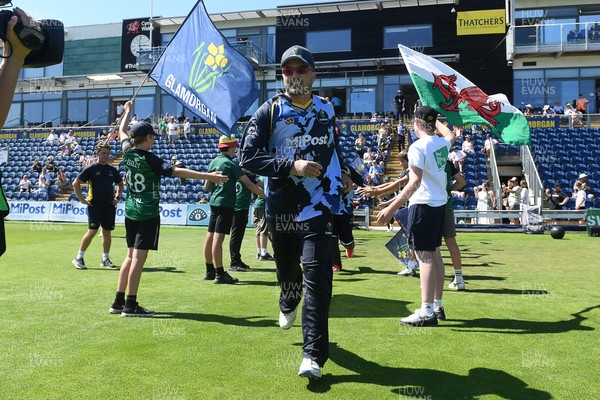 130725 - Glamorgan v Gloucestershire - T20, Vitality Blast - Kiran Carlson of Glamorgan runs out for the start of the match