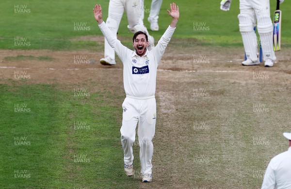130921 - Glamorgan v Gloucestershire - LV= County Championship - Andrew Salter of Glamorgan successfully appeals for the wicket of Ryan Higgins as he bowls him for LBW