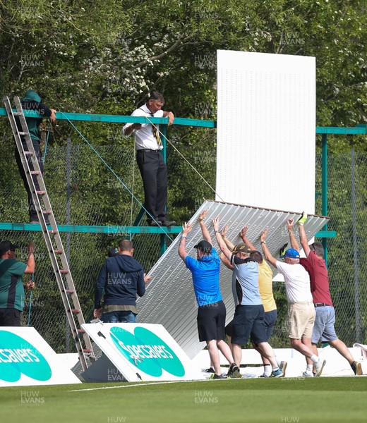 150519 - Glamorgan v Gloucestershire, Specsavers County Championship Division 2, Day 2 - The sight screen that collapsed towards David Payne of Gloucestershire is repaired during the interval