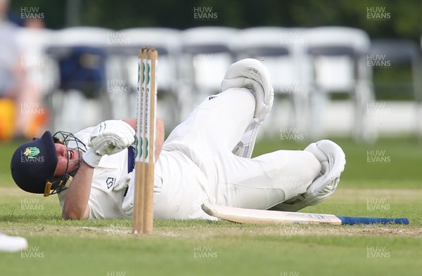 150519 - Glamorgan v Gloucestershire, Specsavers County Championship Division 2, Day 2 - Chris Cooke of Glamorgan goes down at the wicket as he picks up an injury