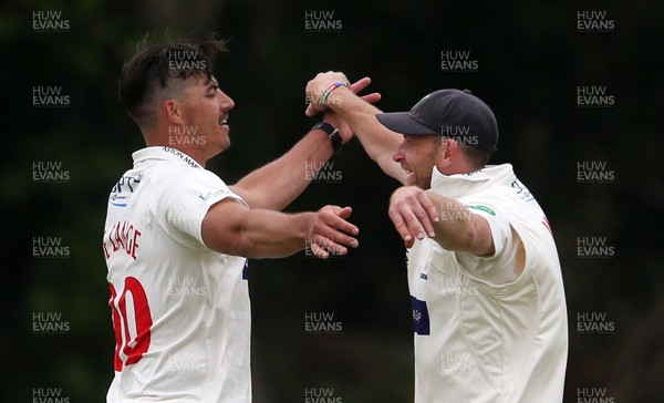 170519 - Glamorgan v Gloucestershire - Specsavers County Championship Division Two - Marchant De Lange celebrates with Graham Wagg after Miles Hammond is caught by Tom Cullen