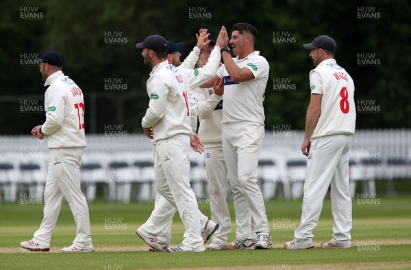 170519 - Glamorgan v Gloucestershire - Specsavers County Championship Division Two - Marchant De Lange of Glamorgan celebrates with team mates after Miles Hammond is caught by Tom Cullen