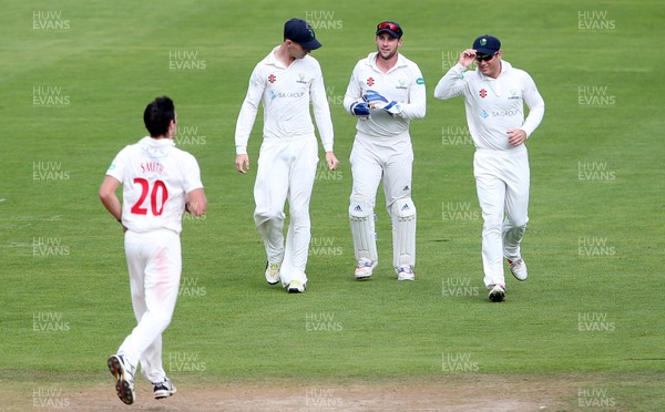 200917 - Glamorgan v Gloucestershire - Specsavers County Championship Division Two - Chris Cooke of Glamorgan celebrates with team mates after taking the wicket of Chris Dent off the bowling of Ruaidhri Smith