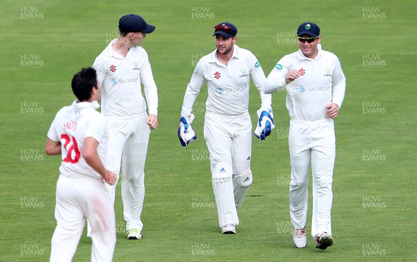 200917 - Glamorgan v Gloucestershire - Specsavers County Championship Division Two - Chris Cooke of Glamorgan celebrates with team mates after taking the wicket of Chris Dent off the bowling of Ruaidhri Smith