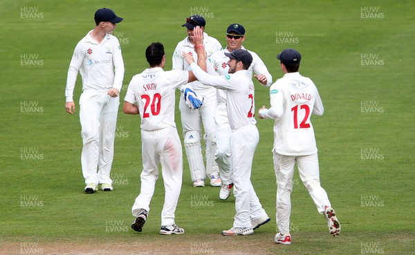 200917 - Glamorgan v Gloucestershire - Specsavers County Championship Division Two - Chris Cooke of Glamorgan celebrates with team mates after taking the wicket of Chris Dent off the bowling of Ruaidhri Smith