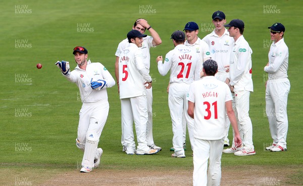 200917 - Glamorgan v Gloucestershire - Specsavers County Championship Division Two - Chris Cooke of Glamorgan celebrates with team mates after taking the wicket of Chris Dent off the bowling of Ruaidhri Smith