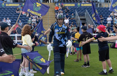 230526 - Glamorgan v Gloucestershire, Vitality Blast Men - Will Smale of Glamorgan and Alex Horton of Glamorgan make their way for the start of the match