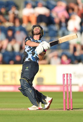 230526 - Glamorgan v Gloucestershire, Vitality Blast Men -  Chris Cooke of Glamorgan  sends the ball towards the boundary but is caught by Craig Miles of Gloucestershire