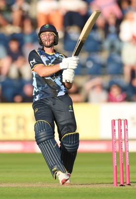 230526 - Glamorgan v Gloucestershire, Vitality Blast Men -  Chris Cooke of Glamorgan  sends the ball towards the boundary but is caught by Craig Miles of Gloucestershire