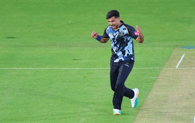 230526 - Glamorgan v Gloucestershire, Vitality Blast Men -  Fazalhaq Farooqi of Glamorgan celebrates as he takes the wicket of Ollie Price of Gloucestershire