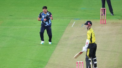 230526 - Glamorgan v Gloucestershire, Vitality Blast Men -  Fazalhaq Farooqi of Glamorgan celebrates as he takes the wicket of Ollie Price of Gloucestershire