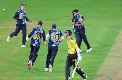 230526 - Glamorgan v Gloucestershire, Vitality Blast Men -  Fazalhaq Farooqi of Glamorgan celebrates as he takes the wicket of Ollie Price of Gloucestershire