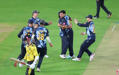 230526 - Glamorgan v Gloucestershire, Vitality Blast Men -  Fazalhaq Farooqi of Glamorgan celebrates as he takes the wicket of Ollie Price of Gloucestershire