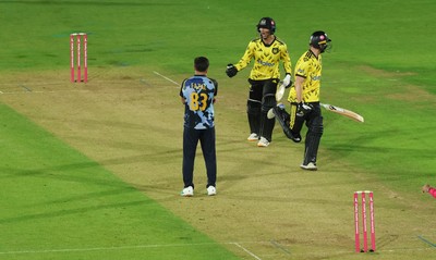 230526 - Glamorgan v Gloucestershire, Vitality Blast Men -  Kamran Dhariwal of Gloucestershire and Matt Taylor of Gloucestershire celebrate the winning runs on the final ball of the match