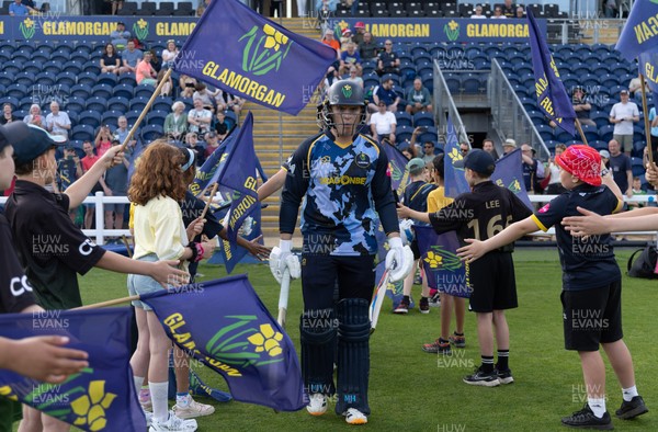 230526 - Glamorgan v Gloucestershire, Vitality Blast Men - Will Smale of Glamorgan and Alex Horton of Glamorgan make their way for the start of the match