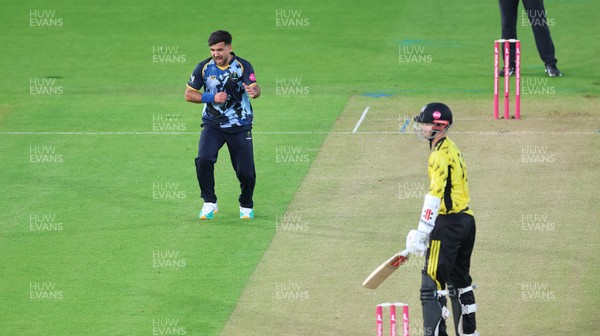 230526 - Glamorgan v Gloucestershire, Vitality Blast Men -  Fazalhaq Farooqi of Glamorgan celebrates as he takes the wicket of Ollie Price of Gloucestershire