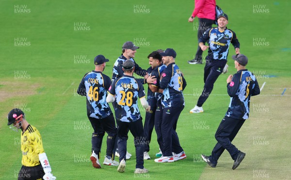 230526 - Glamorgan v Gloucestershire, Vitality Blast Men -  Fazalhaq Farooqi of Glamorgan celebrates as he takes the wicket of Ollie Price of Gloucestershire
