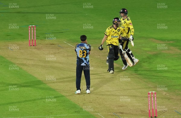 230526 - Glamorgan v Gloucestershire, Vitality Blast Men -  Kamran Dhariwal of Gloucestershire and Matt Taylor of Gloucestershire celebrate the winning runs on the final ball of the match