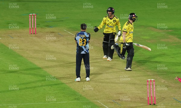 230526 - Glamorgan v Gloucestershire, Vitality Blast Men -  Kamran Dhariwal of Gloucestershire and Matt Taylor of Gloucestershire celebrate the winning runs on the final ball of the match