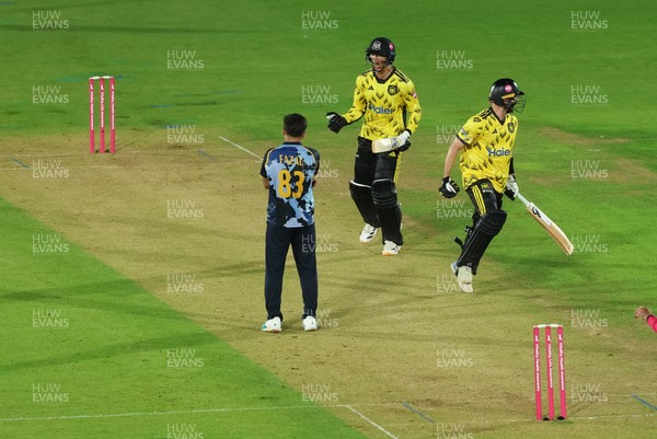 230526 - Glamorgan v Gloucestershire, Vitality Blast Men -  Kamran Dhariwal of Gloucestershire and Matt Taylor of Gloucestershire celebrate the winning runs on the final ball of the match