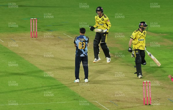 230526 - Glamorgan v Gloucestershire, Vitality Blast Men -  Kamran Dhariwal of Gloucestershire and Matt Taylor of Gloucestershire celebrate the winning runs on the final ball of the match