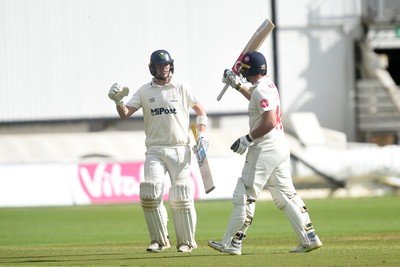 280924 - Glamorgan v Gloucestershire - County Championship - Chris Cooke of Glamorgan celebrates with Sam Northeast of Glamorgan after hitting a century