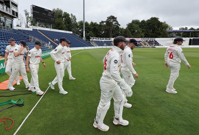 290625  Glamorgan v Gloucestershire, Rothesay County Championship Division 2 - Glamorgan head out for the start of the match