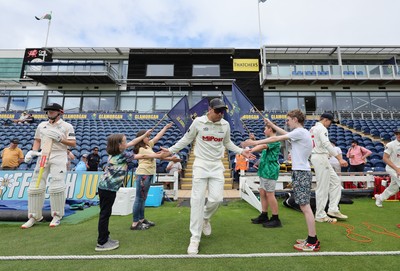 290625  Glamorgan v Gloucestershire, Rothesay County Championship Division 2 - Colin Ingram of Glamorgan makes his way through the guard of honour
